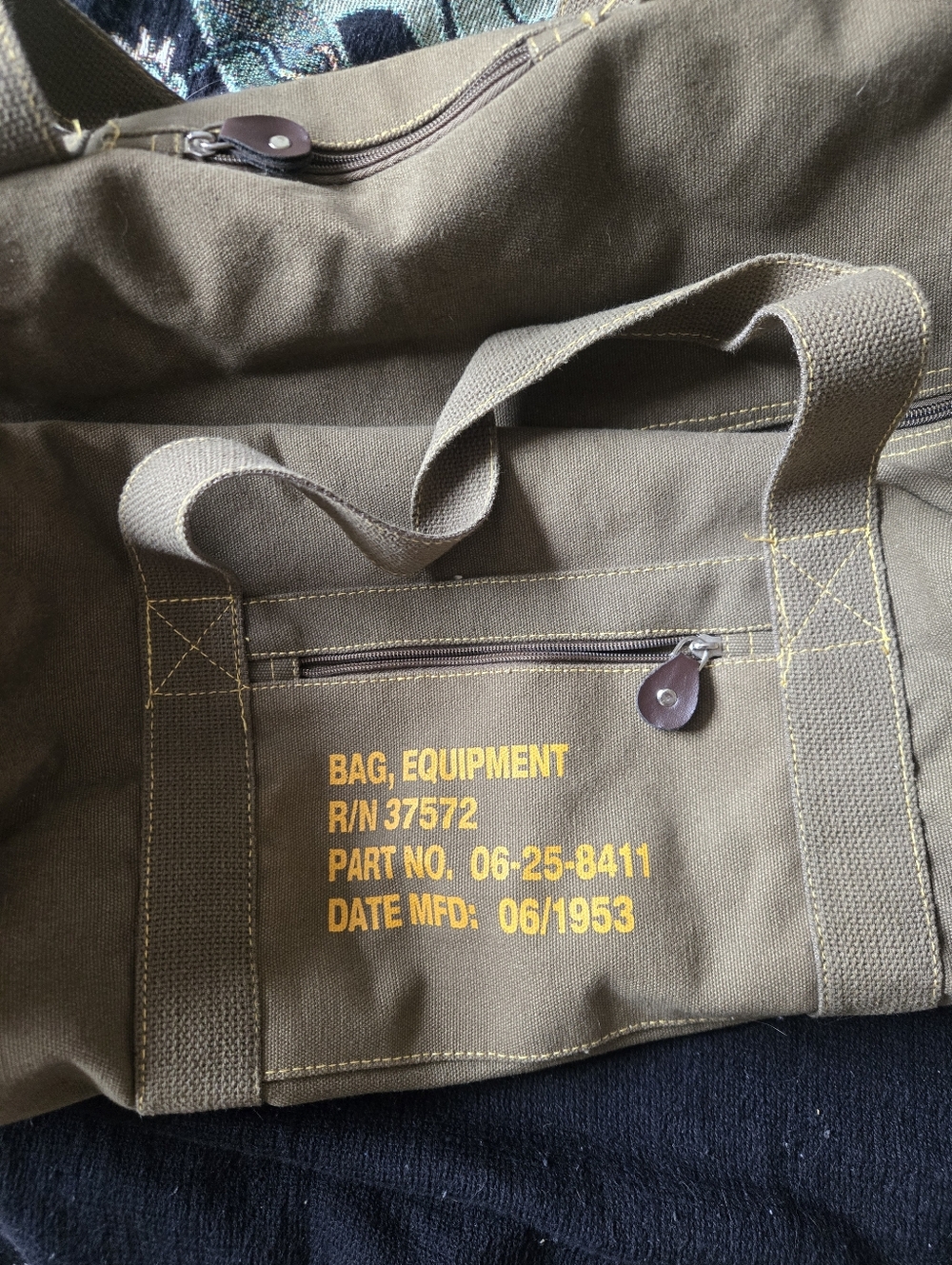 Military-Style Olive Canvas Gear Bag with Yellow Stencil